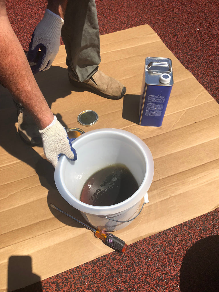 Cleaning tools and mixers in a poured in rubber install