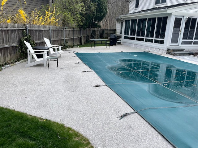 How do I maintain my pool deck rubber surface?